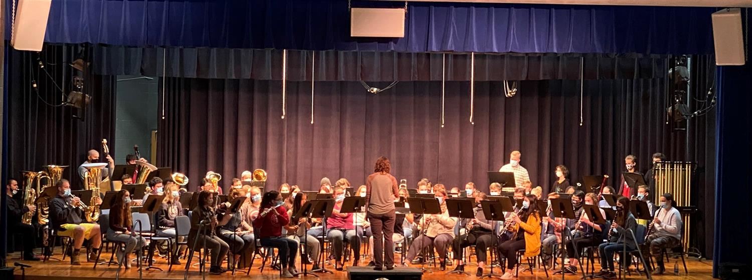 Symphonic Band Performing on Stage