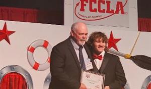 Dr. Craft receiving an award